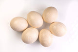 The Fine Zebra Carved Ostrich Egg Ornament from Leo & Stripes